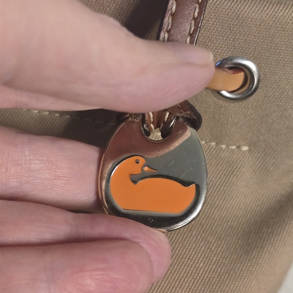 Dooney & Bourke Tassel Canvas/ Leather Satchel - Picture 3 of 12